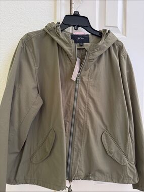 NWT, Jcrew  light weight hooded wind jacket .